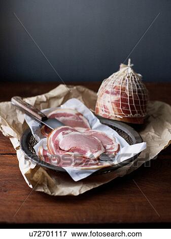 Stock Photo - Slices of pancetta. Fotosearch