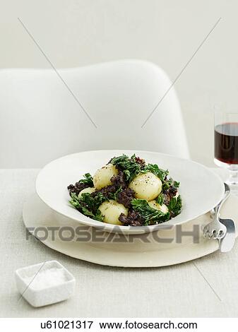Steamed potatoes with blood sausage and barley View Large Photo Image Stock Photo - Steamed potatoes with blood sausage and barley. Fotosearch