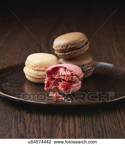 Strawberry, Vanilla and Chocolate flavoured almond macaroons View Large Photo Image Stock Image - Strawberry, Vanilla and Chocolate flavoured almond macaroons. Fotosearch