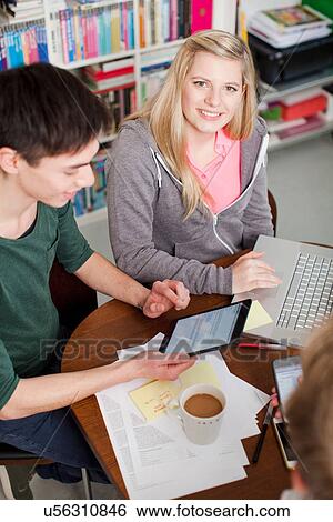 Students working on laptop, high angle View Large Photo Image Stock Photograph - Students working on laptop, high angle. Fotosearch