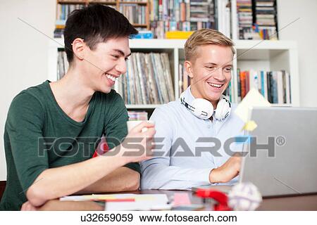 Students working on laptop View Large Photo Image Stock Photo - Students working on laptop. Fotosearch