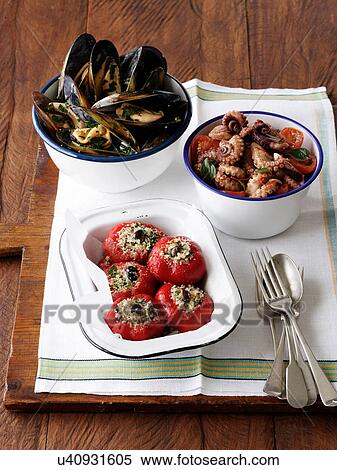 Stuffed peppers, peppered mussels and octopus View Large Photo Image Stock Photography - Stuffed peppers, peppered mussels and octopus. Fotosearch