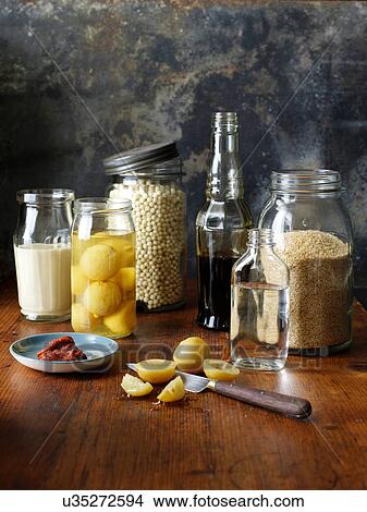 Tahini, preserved lemons, moghrabieh, pomegranate molasses, rosewater, cous cous, and harissa paste View Large Photo Image Picture - Tahini, preserved lemons, moghrabieh, pomegranate molasses, rosewater, cous cous, and harissa paste. Fotosearch