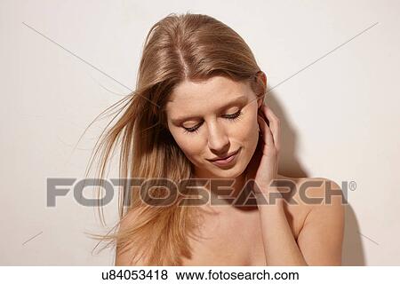 Stock Photo - Woman posing. Fotosearch