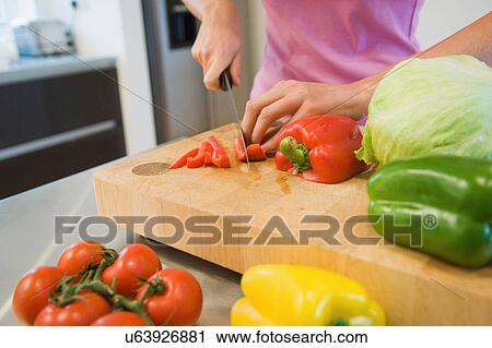 Woman preparing salad View Large Photo Image Stock Image - Woman preparing salad. Fotosearch