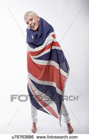 Woman wrapped in union flag View Large Photo Image Stock Photograph - Woman wrapped in union flag. Fotosearch