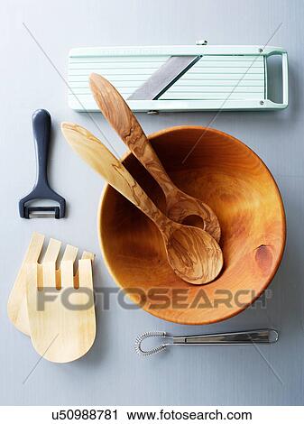 Wooden salad bowl and kitchen utensils View Large Photo Image Stock Image - Wooden salad bowl and kitchen utensils. Fotosearch