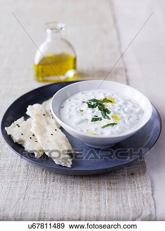 Yoghurt and cucumber dip View Large Photo Image Stock Photo - Yoghurt and cucumber dip. Fotosearch