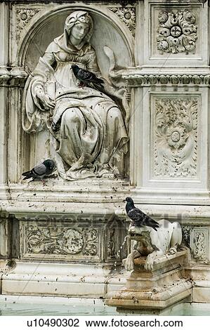 Stock Image - Architectural detail, Fountain of Joy, Siena, Italy. Fotosearch
