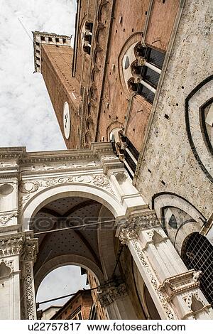 Architectural detail of Torre del Mangia, Siena, Italy View Large Photo Image Stock Photo - Architectural detail of Torre del Mangia, Siena, Italy. Fotosearch