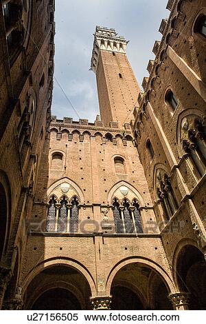 Architectural detail of Torre del Mangia, Siena, Italy View Large Photo Image Stock Photography - Architectural detail of Torre del Mangia, Siena, Italy. Fotosearch