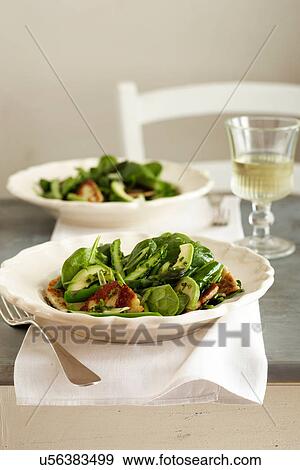 Baby spinach salad View Large Photo Image Stock Photo - Baby spinach salad. Fotosearch