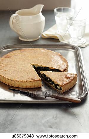 Stock Photo - Baked spinach pie. Fotosearch