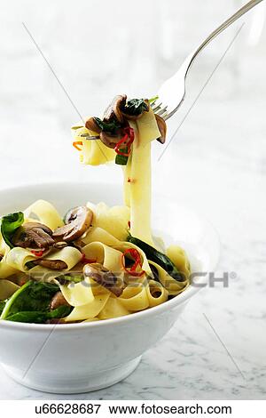 Bowl of fettucini pasta View Large Photo Image Stock Photo - Bowl of fettucini pasta. Fotosearch