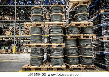 Cable drums stacked on pallets in warehouse View Large Photo Image Stock Image - Cable drums stacked on pallets in warehouse. Fotosearch