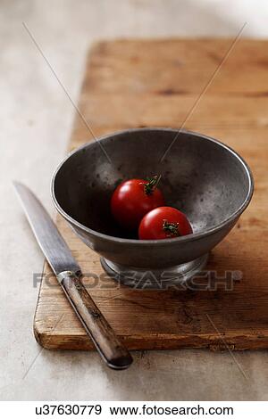 Cherry tomatoes in bowl View Large Photo Image Stock Photo - Cherry tomatoes in bowl. Fotosearch