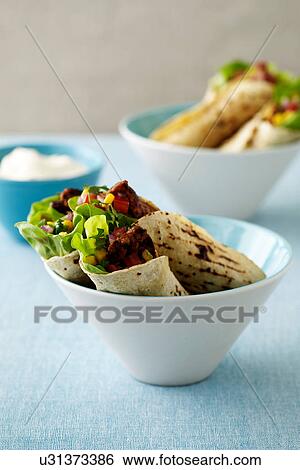 Chicken tortilla wraps View Large Photo Image Stock Photograph - Chicken tortilla wraps. Fotosearch