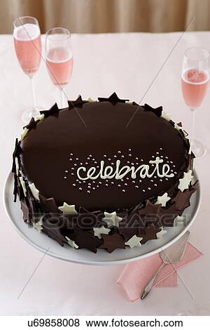 Chocolate cake with word 'celebrate' View Large Photo Image Stock Photo - Chocolate cake with word 'celebrate'. Fotosearch