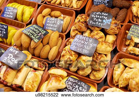 Stock Image - Choice of pastries for sale in Boqueria Market, Barcelona, Spain. Fotosearch