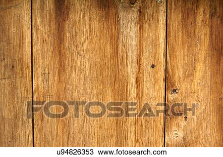 Stock Image - Close up of wood grain pattern on planks. Fotosearch