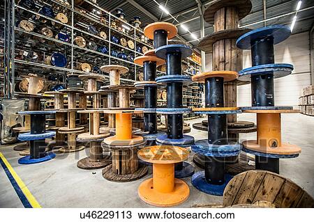 Empty cable drums stacked in warehouse View Large Photo Image Stock Image - Empty cable drums stacked in warehouse. Fotosearch