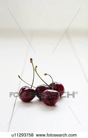 Stock Photo - Four cherries. Fotosearch