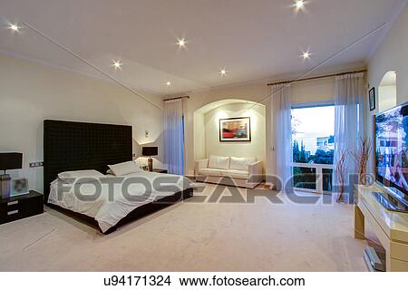 Luxury bedroom in wealthy home View Large Photo Image Picture - Luxury bedroom in wealthy home. Fotosearch