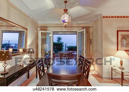 Luxury dining room in wealthy home View Large Photo Image Stock Photo - Luxury dining room in wealthy home. Fotosearch