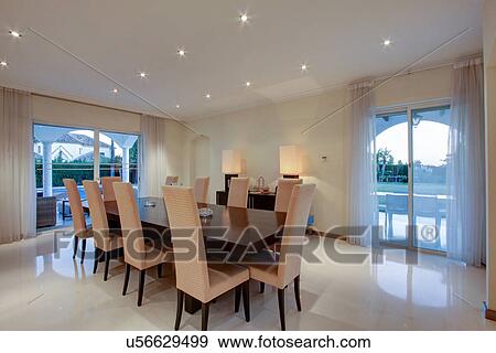 Luxury dining room in wealthy home View Large Photo Image Stock Photo - Luxury dining room in wealthy home. Fotosearch