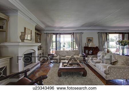 Stock Photograph - Luxury living room in wealthy home. Fotosearch