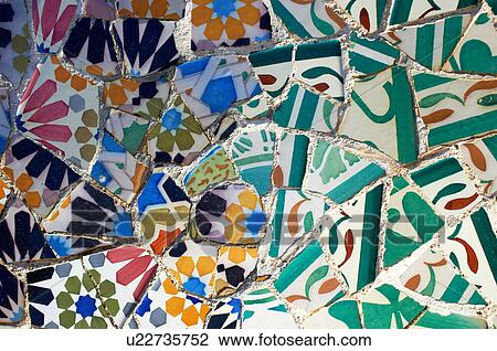 Stock Image - Multicoloured and cracked tiles in mosaic, Barcelona, Spain. Fotosearch
