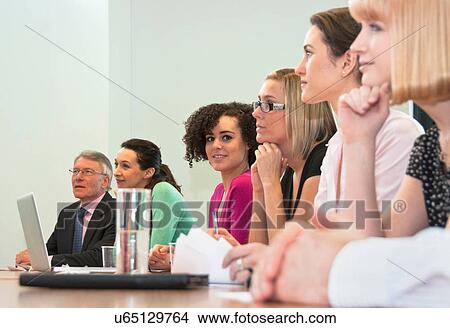Office colleagues in meeting View Large Photo Image Picture - Office colleagues in meeting. Fotosearch