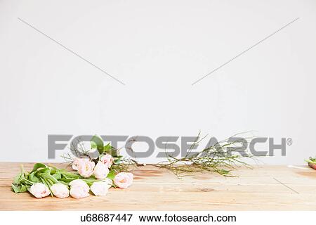 Pink roses to be arranged in florists View Large Photo Image Stock Photo - Pink roses to be arranged in florists. Fotosearch