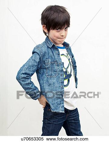 Portrait of boy against white background View Large Photo Image Stock Photography - Portrait of boy against white background. Fotosearch
