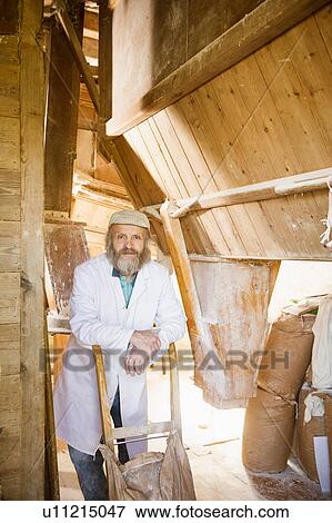 Portrait of man in windmill View Large Photo Image Stock Photo - Portrait of man in windmill. Fotosearch