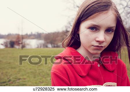 Portrait of pensive girl outdoors View Large Photo Image Stock Photography - Portrait of pensive girl outdoors. Fotosearch