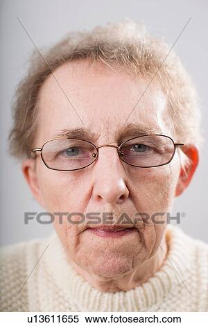 Portrait of senior woman wearing glasses View Large Photo Image Stock Photography - Portrait of senior woman wearing glasses. Fotosearch