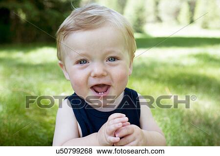 Portrait of toddler boy smiling View Large Photo Image Stock Photo - Portrait of toddler boy smiling. Fotosearch