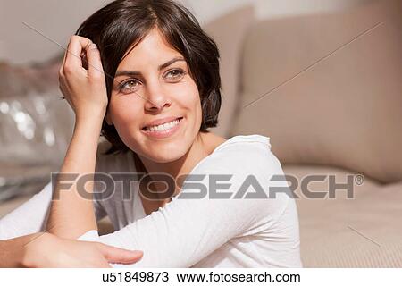 Stock Image - Portrait of woman looking away. Fotosearch