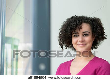 Portrait of young female office worker View Large Photo Image Picture - Portrait of young female office worker. Fotosearch