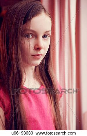 Portrait of young girl with long brown hair View Large Photo Image Stock Image - Portrait of young girl with long brown hair. Fotosearch