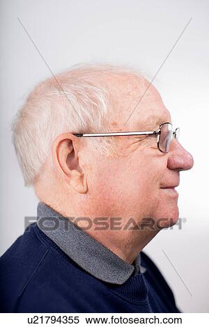 Profile of senior man wearing glasses, studio shot View Large Photo Image Stock Photography - Profile of senior man wearing glasses, studio shot. Fotosearch