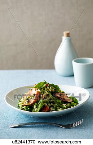 Stock Image - Salmon and risoni salad. Fotosearch