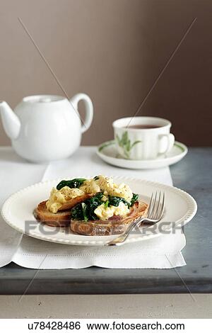 Scrambled eggs on crusty bread View Large Photo Image Stock Photograph - Scrambled eggs on crusty bread. Fotosearch