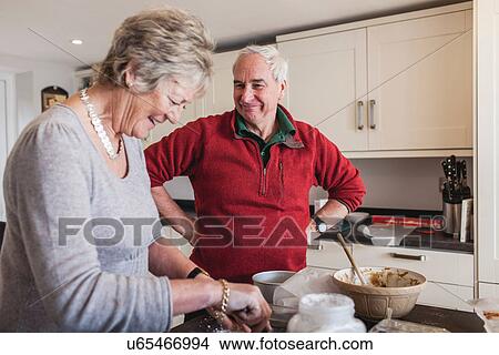 Senior couple baking View Large Photo Image Picture - Senior couple baking. Fotosearch