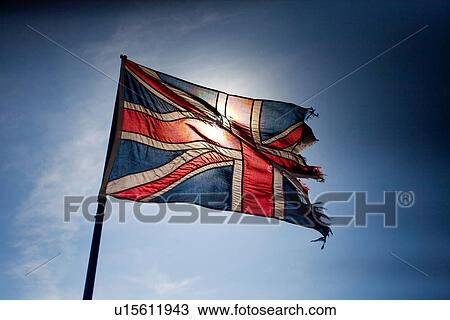 Torn Union Jack flag flying View Large Photo Image Stock Image - Torn Union Jack flag flying. Fotosearch