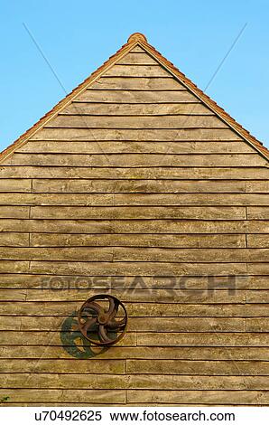 Stock Photography - Wooden wall and roof of building. Fotosearch