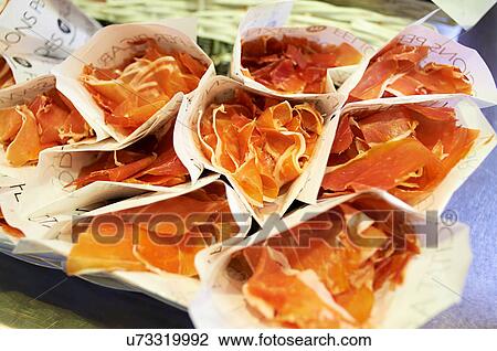 Wrapped cured ham slices for sale in Boqueria Market, Barcelona, Spain View Large Photo Image Stock Image - Wrapped cured ham slices for sale in Boqueria Market, Barcelona, Spain. Fotosearch