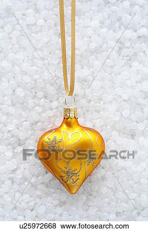 Stock Photo - Yellow and gold bauble. Fotosearch