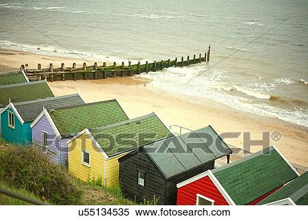 Stock Photography - Beach huts by the sea, Southwold, Suffolk, UK. Fotosearch